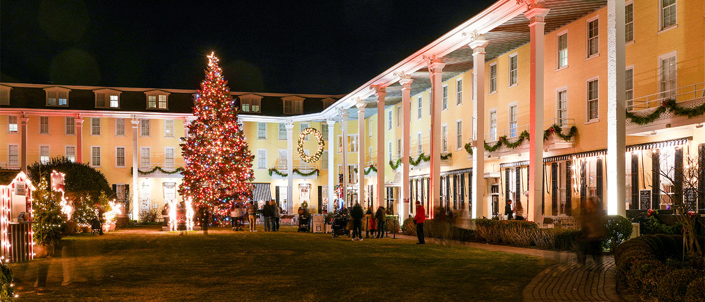 Historic Congress Hall great lawn with a lighted Christmas tree